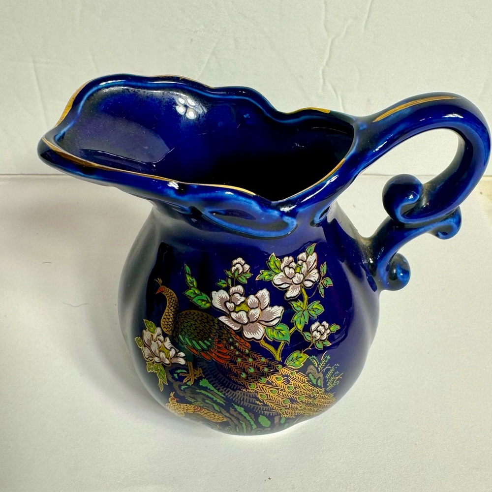 Vintage Cobalt Blue Pitcher creamer decorated with gold trim and two Peacocks